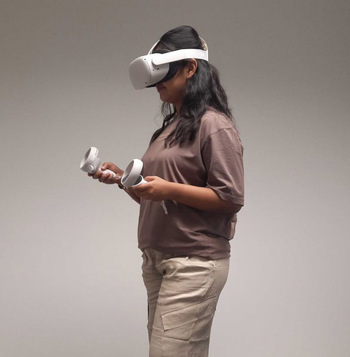 Aaddya tests out VR equipment.